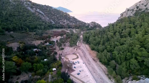 The scenic view of the ancient city of Olympos by drone

