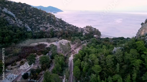 The scenic view of the ancient city of Olympos by drone

