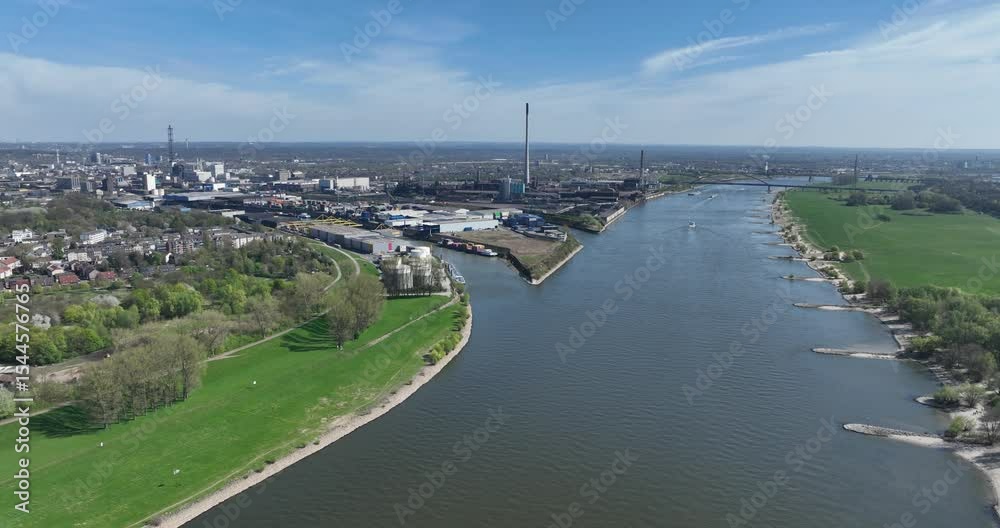 Aerial scene of Port entrance at Duisburg along the Rhine River, Germany on a sunny day Aerial scene of Port entrance at Duisburg along the Rhine River, Germany on a sunny day