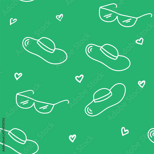Seamless Pattern With Sunglasses, Hats, and Hearts on a Green Background