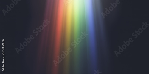 A vertical arrangement of blurred rainbow colored light streaks on a dark background