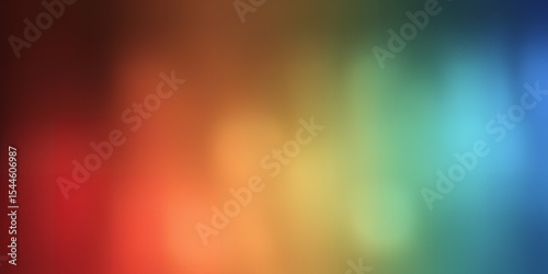 Abstract blurred background featuring a gradient of vibrant colors across the frame