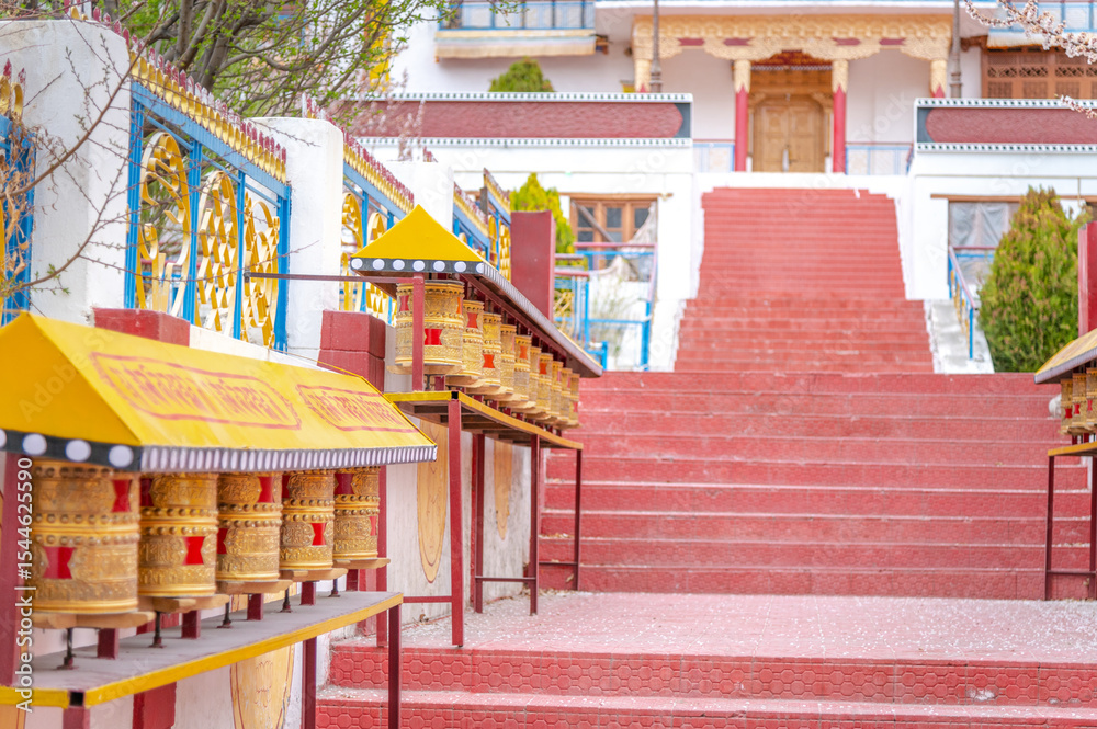 Fototapeta premium Samstanling Monastery with prayer wheels and stone stairs in Nubra Valley, Ladakh, India