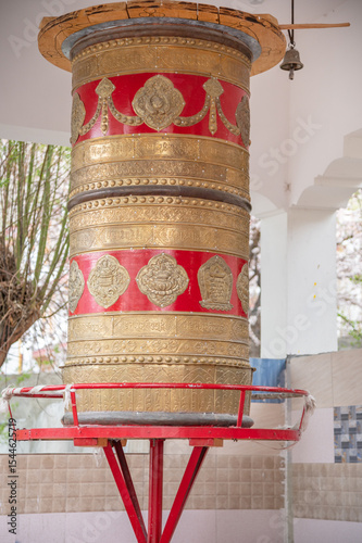 Close-up of a traditional Buddhist prayer wheel at Samstanling Monastery, Ladakh, India