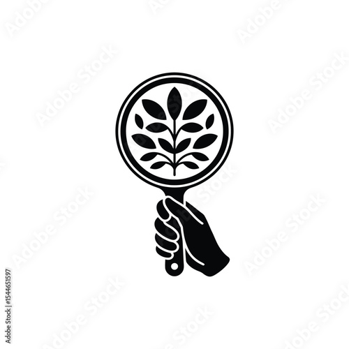 Hand Holding Round Mirror Showing Leafy Plant in Black and White Style