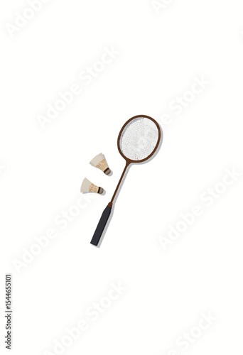Tennis racket with two felt racquet balls on white background  
