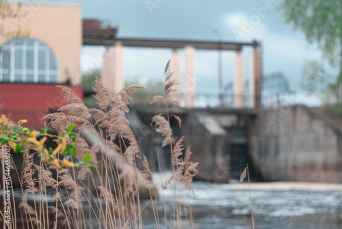 Dam of small hydroelectric power station, water discharge through locks