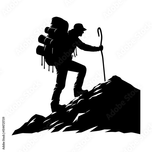 Silhouette of backpacker ascending a mountain