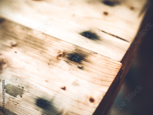 the black self-tapping screw is screwed into the wood