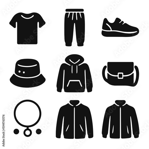 Casual City Style Icons. Solid, filled icons set of casual city looks: relaxed tee, stylish joggers, city
