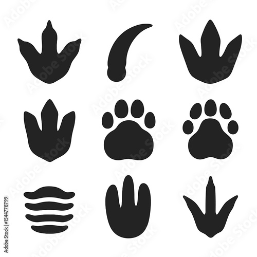 Prehistoric Footprint Icons. Solid, filled icons set of prehistoric animal footprints: dinosaur track, raptor