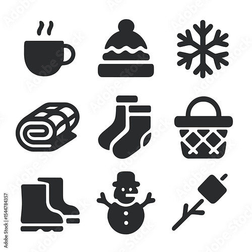 Winter Picnic Icons. Solid, filled icons set of winter picnic fun: hot drink cup, cozy hat, snowflake, plaid blanket, warm socks, picnic basket, snow boots, snowman icon, marshmallow treat.