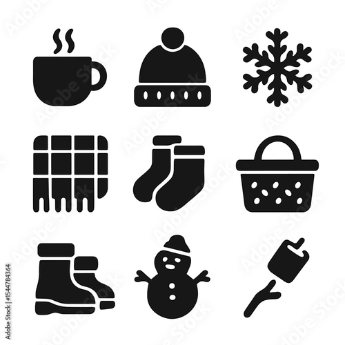 Winter Picnic Icons. Solid, filled icons set of winter picnic fun: hot drink cup, cozy hat, snowflake, plaid blanket, warm socks, picnic basket, snow boots, snowman icon, marshmallow treat.