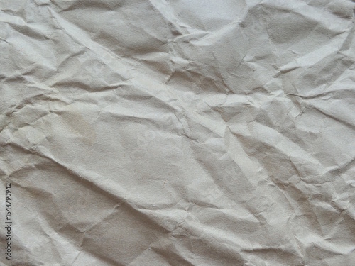 the texture of crumpled gray paper in close-up.