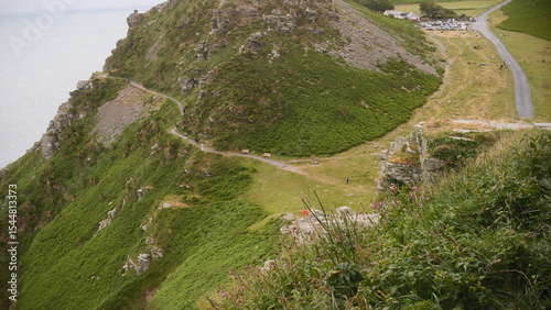 A road scene showcasing road, landscape and mountains, captured in film style.