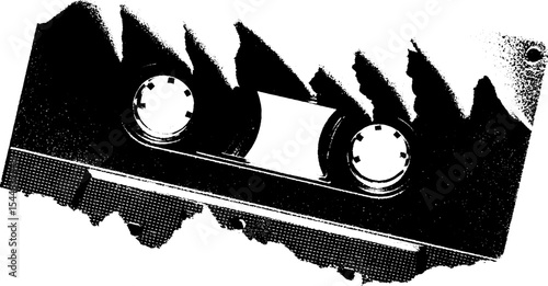Retro vibes: torn cassette tape spool in high contrast black and white design