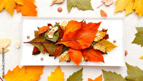 Crushed autumn leaves in epoxy resin with copper leaf accents, seasonal background for fall festivals or home decor catalogs