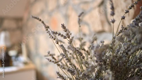 Dried Lavender and Rustic Stone Wall in a Warm Mediterranean Home Interior with Soft Natural Light