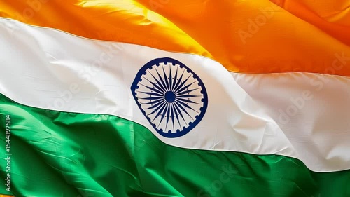 Vibrant indian flag waving in slow motion on a sunny day
