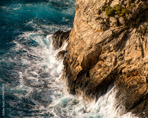 Waves crashing on rocks