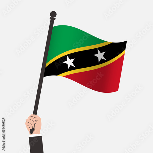 Hand Holding Saint kitts and Nevis Waving Flag