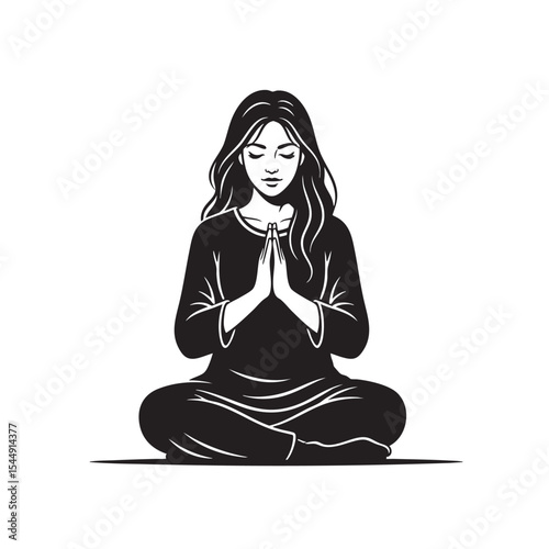 Woman in lotus position with hands in prayer pose for meditation