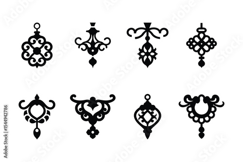 Elegant Black and White Decorative Ornament Set. This set features nine distinct, ornate decorative elements.