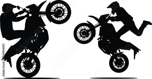 Silhouette of stunt motorcyclists showcasing balance, control, and high-energy mid-air action