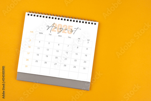 Wallpaper Mural Top view of August 2025 desk calendar on yellow color background. Torontodigital.ca