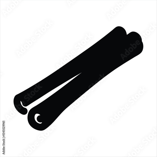 Striking black and white silhouette of two cinnamon sticks side by side