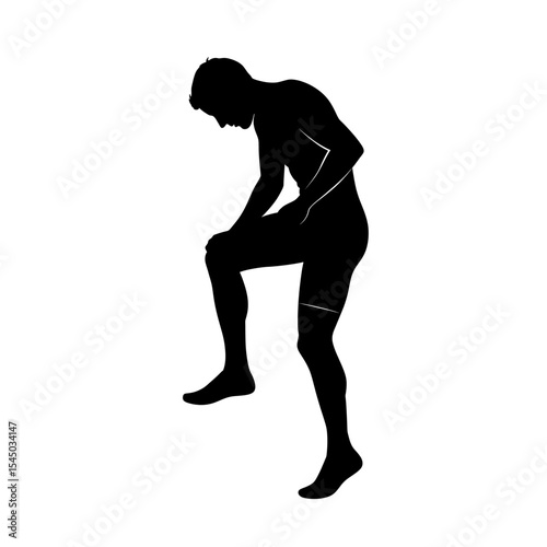 Silhouette of a tired athlete man resting after intense workout or long running session, symbol of fatigue and determination