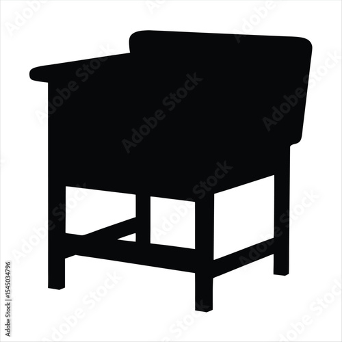 Silhouette of an old fashioned desk with a built in chair