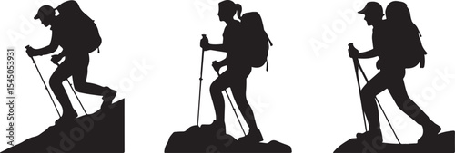 Hikers with backpacks and trekking poles silhouette