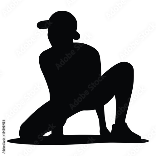 woman in Crouched breakdance freeze dance pose, A bold, black silhouette of a person wearing a cap, positioned in a kneeling or crouching posture.
