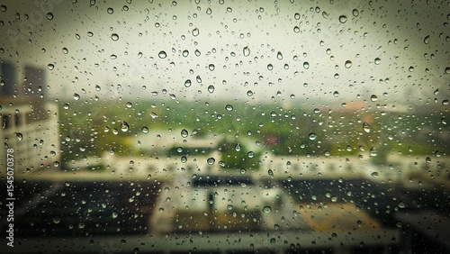 Holiday background image of water drops on glass