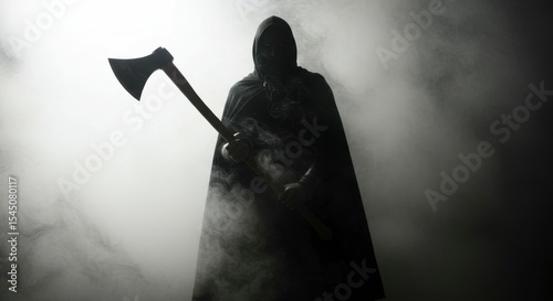 Dark figure with axe in smoky setting