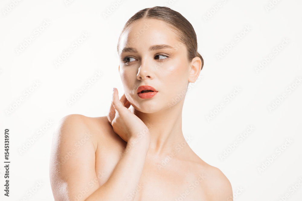 Skin care. Woman with healthy facial skin on isolated background. Beautiful model girl with natural makeup enjoying moisturized skin close-up. Skin care. Woman with healthy facial skin on isolated background. Beautiful model girl with natural makeup enjoying moisturized skin close-up.