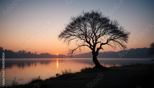 Title: Lone Tree Silhouetted at Sunset by Reflective Water, Concept of Tranquility, Inner Peace, and the Beauty of Stillness in Nature