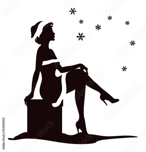 Elegant Silhouette of Woman in Santa Hat Surrounded by Snowflakes