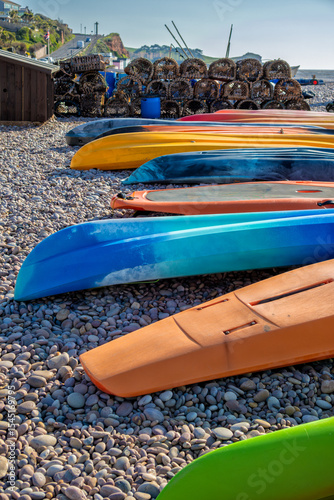 Lobster crab pots and canoes on the beach at Budleigh Salterton, Devon, United Kingdom photo