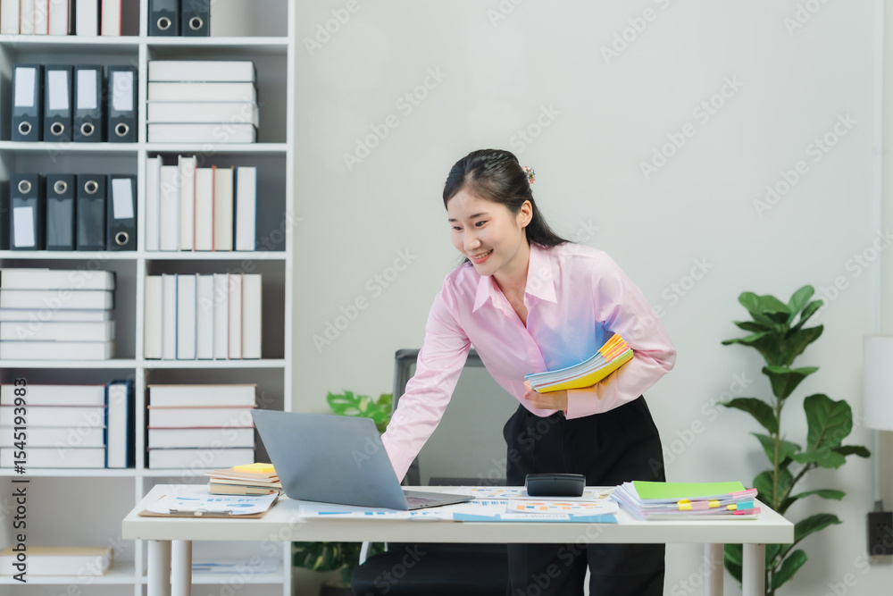Young Woman Working at Desk with Laptop Young Woman Working at Desk with Laptop