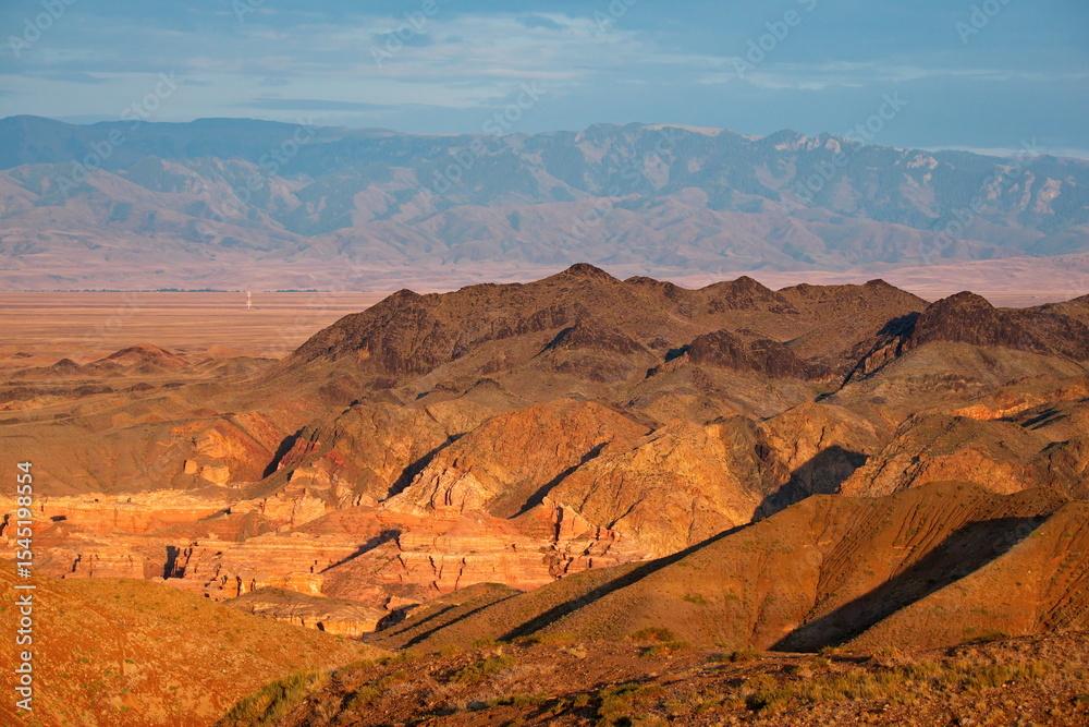 Naklejka premium South-East Kazakhstan. Picturesque mountains in the area of the natural national Park Charyn Canyon. The height of the steep mountains of the canyon reaches 150-300 m.