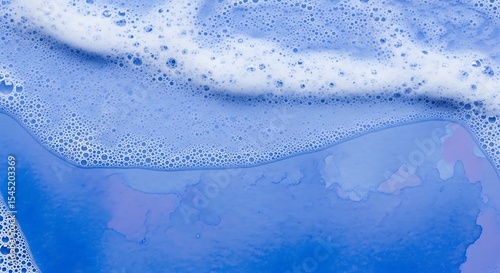 Abstract blue background with white soap suds and bubbles
