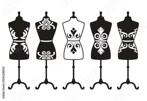 Five ornate fashion mannequins in black and white