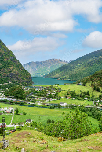 Expansive view of Flam village and river in a scenic Norwegian valley
