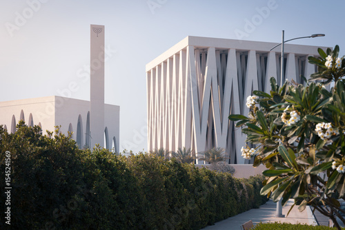 Synagogue and Mosque modern buildings in Abrahamic Family House religion complex sunny day, Abu Dhabi