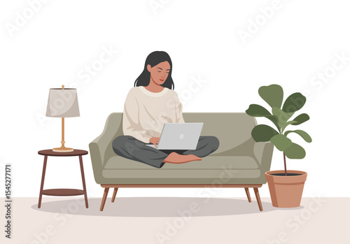 Woman Working on Laptop Relaxed on Sage Green Sofa with Plant and Table Lamp computer