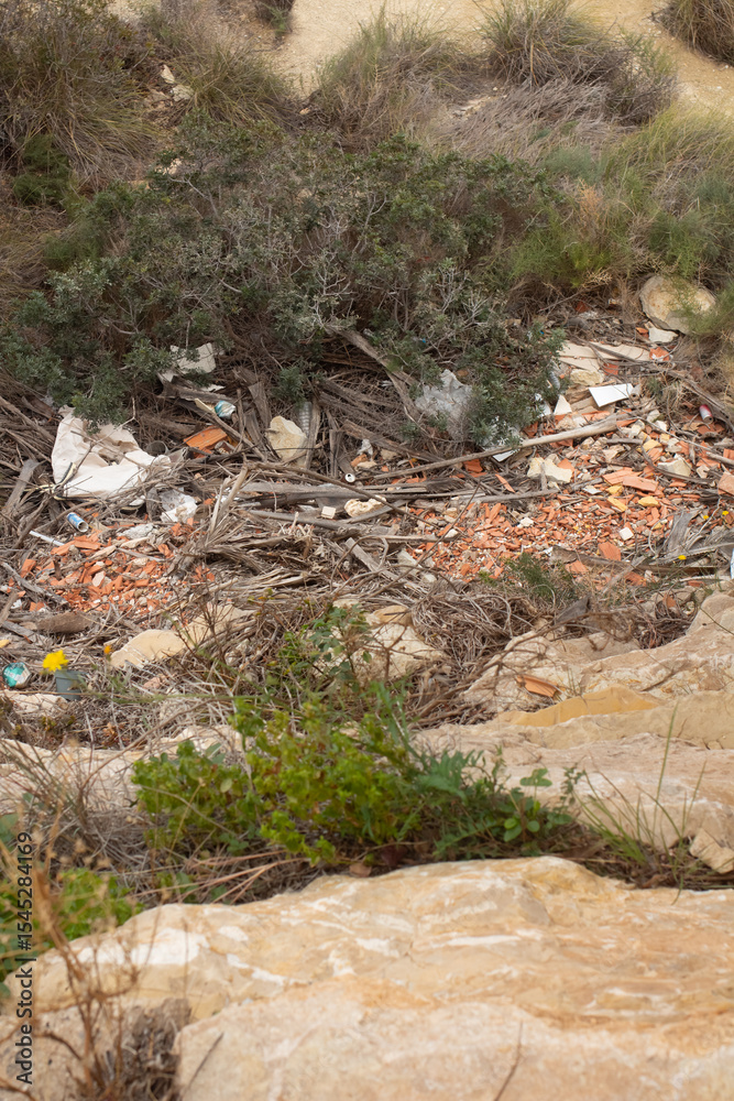 Overlooking the natural landscape marred by waste in Spain's scenic terrain during a quiet afternoon Overlooking the natural landscape marred by waste in Spain's scenic terrain during a quiet afternoon