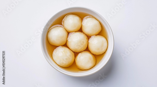 Top view of rasgulla in bowl on white background