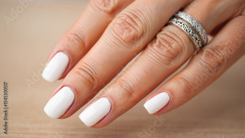 Beautiful hands of a woman with high-quality neutral manicure, nails, nail design, manicure